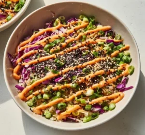Healthy egg roll in a bowl featuring vibrant coleslaw mix.