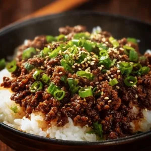 Korean Ground Beef Bowl garnished with vegetables and sesame seeds
