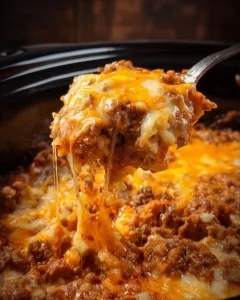 Delicious Crockpot Taco Casserole baked with layers of taco flavors
