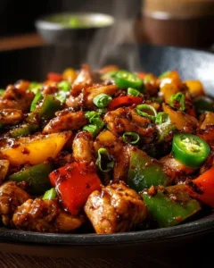 Spicy jalapeño chicken stir-fry served with colorful vegetables in a bowl